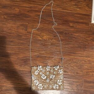 Francesca's Collections Tan Floral Clutch